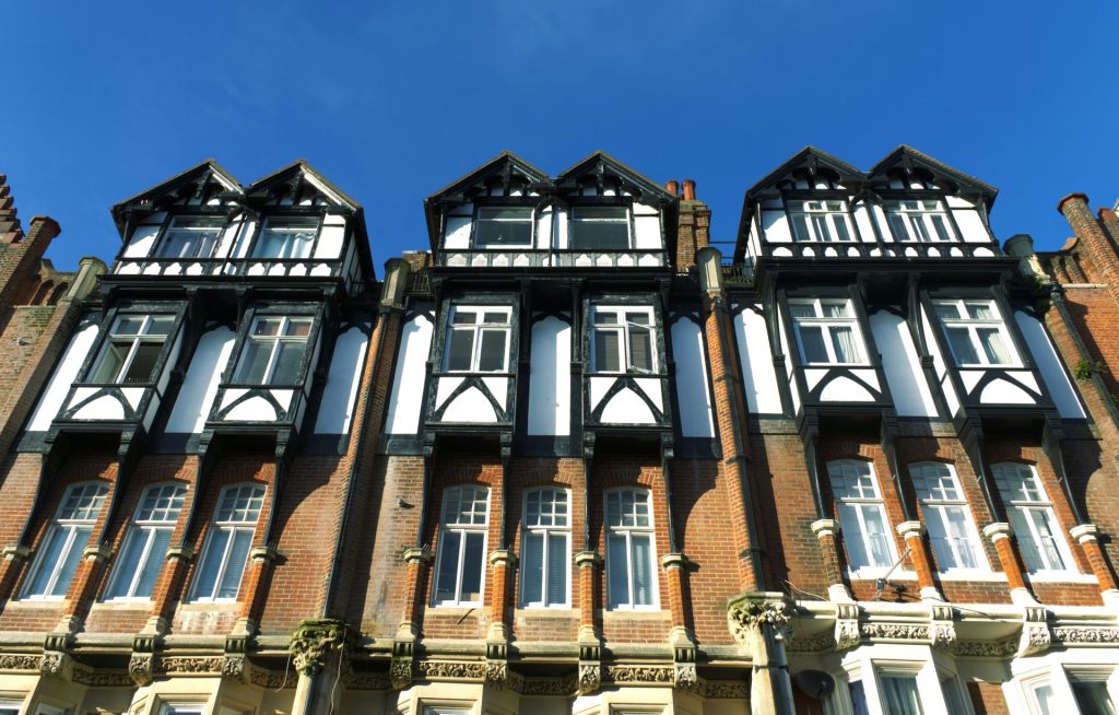 A tall building with lots of windows on top of it