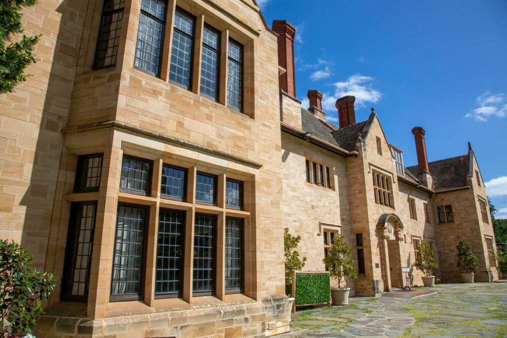 a large stone building with many windows