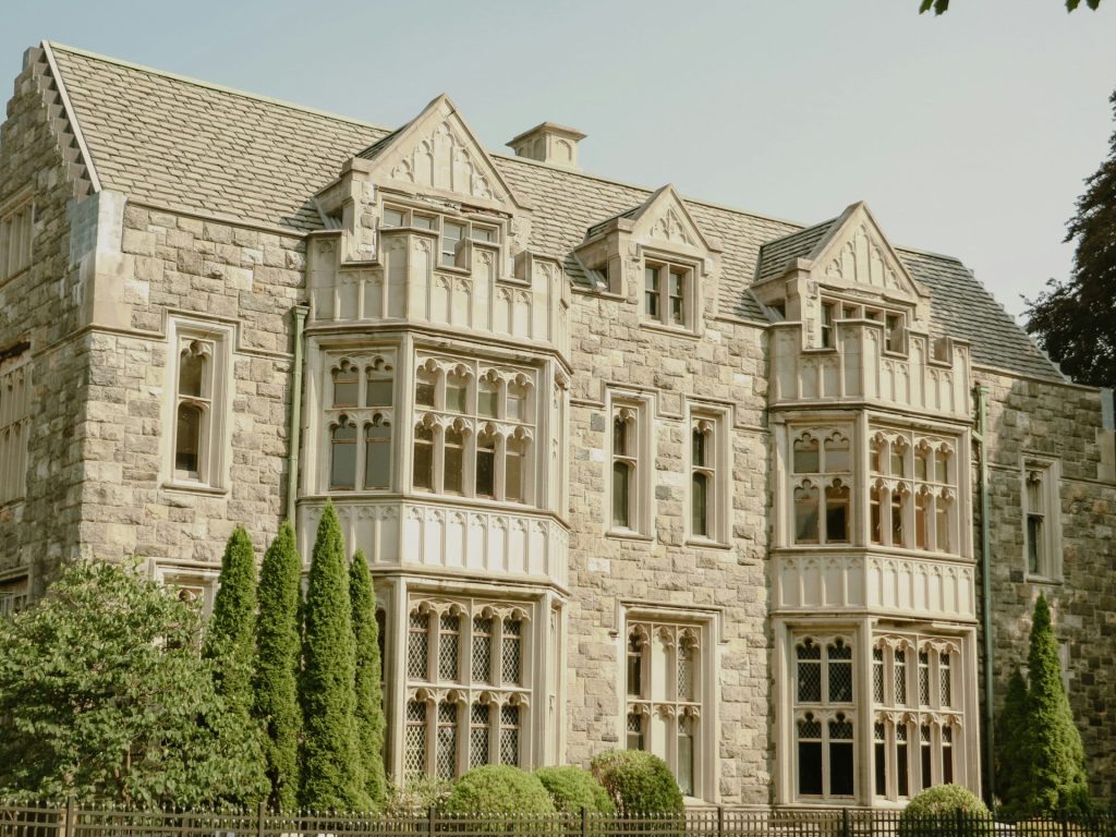 a large stone building with lots of windows